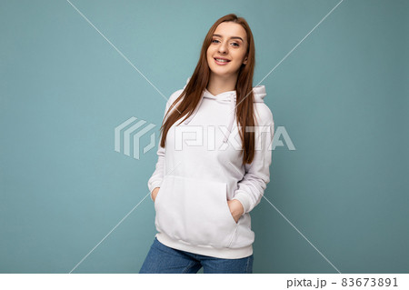 Photo of beautiful positive smiling adult woman wearing stylish clothes standing isolated on Photo of beautiful positive smiling adult woman wearing stylish clothes standing isolated on 83673891