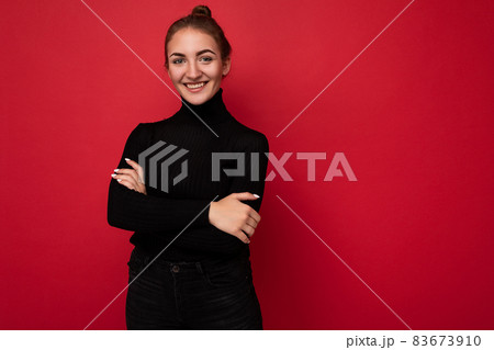 Photo of cute nice winsome positive adult woman wearing casual outfit isolated on background wall Photo of cute nice winsome positive adult woman wearing casual outfit isolated on background wall 83673910