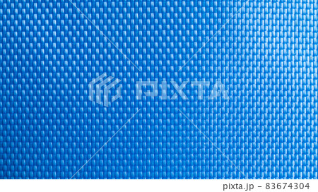 Nylon blue texture. Dark polyester fiber material for sport cloth or abstract weave background. Carbon pattern for wallpaper, graphic design. 83674304