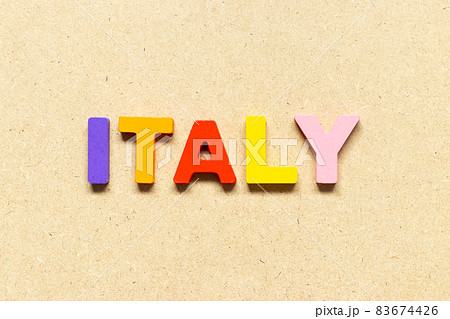Color alphabet letter with word italy on wood background 83674426
