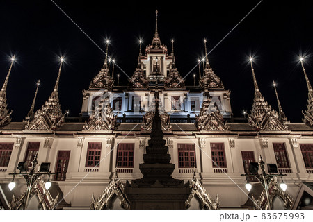 Golden shining Loha Prasat (Metal Castle) lit up at night, a pyramid shaped Buddhist temple from 1846 for meditation in Wat Ratchanatdaram, Here It is the most tourist destination landmark in Phra Golden shining Loha Prasat (Metal Castle) lit up at night, a pyramid shaped Buddhist temple from 1846 for meditation in Wat Ratchanatdaram, Here It is the most tourist destination landmark in Phra 83675993