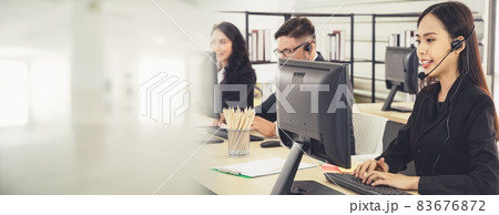 Business people wearing headset working in office broaden view 83676872