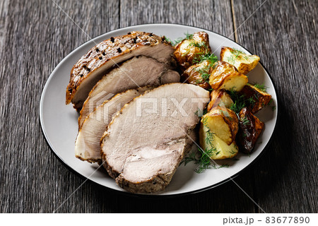 Bohemian pork roast with potatoes, pork shoulder Bohemian pork roast with potatoes, pork shoulder 83677890