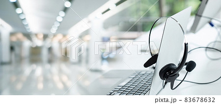 Headset and customer support equipment at call center ready for actively service 83678632
