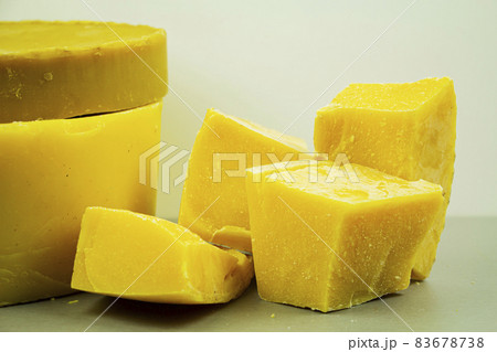 large pieces of natural beeswax, close-up, raw materials for candles. large pieces of natural beeswax, close-up, raw materials for candles. 83678738