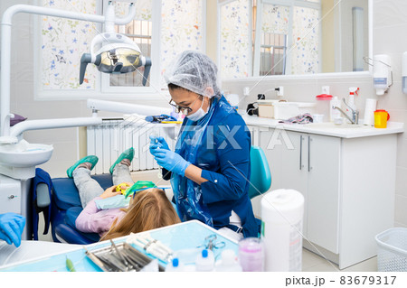 for Children use application anesthesia - gel is applied to gum before injection 83679317