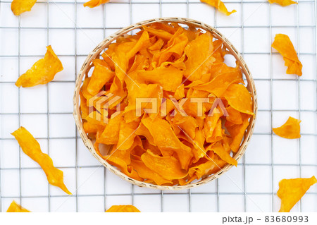 Sweet potato chips on white background. 83680993