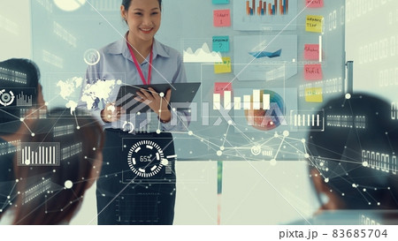 Business people in corporate staff meeting with envisional graphic 83685704