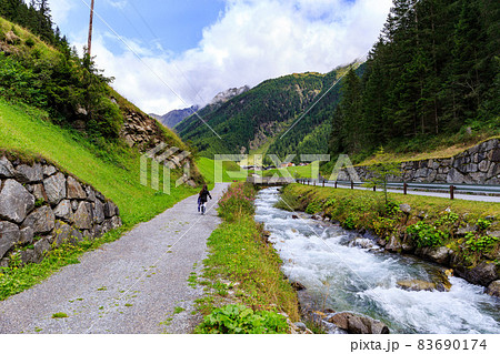 The summer view of Umhausen village Tirol Austria 83690174