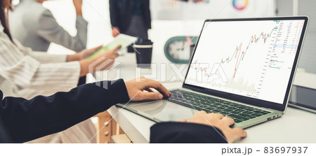 Businesswoman in analyze stock market data using laptop computer proficiently Businesswoman in analyze stock market data using laptop computer proficiently 83697937
