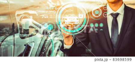 Electric car virtual reality concept with EV charging station for green energy 83698599