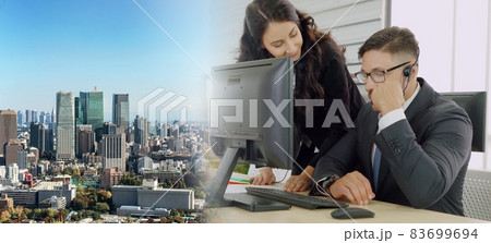 Business people wearing headset working in office broaden view Business people wearing headset working in office broaden view 83699694