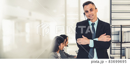 Business people wearing headset working in office broaden view 83699695