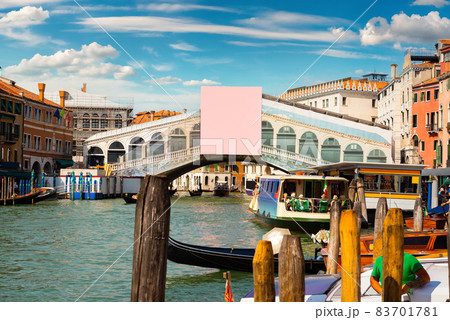 Rialto bridge and gondolas Rialto bridge and gondolas 83701781
