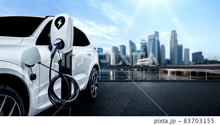 EV charging station for electric car in concept of green energy and eco travel EV charging station for electric car in concept of green energy and eco travel 83703155