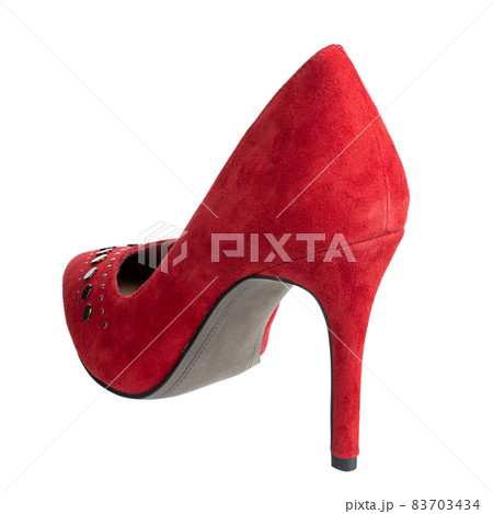 Red women's shoes on a white background. Suede shoes. Stylish and sexy shoes. 83703434