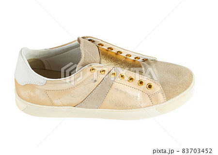 Stylish womens sneakers isolated white background. Stylish womens sneakers isolated white background. 83703452