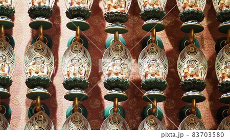 Buddha statue. Buddhist sculpture. images of chinese buddha in Singapore temple. Buddha Tooth relic temple China town which has statue of Cintamanicakra Acala Manjushri Maitreya and Samantabhadra. 83703580