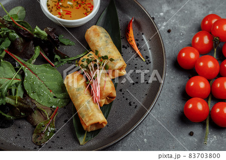 Spring rolls with shrimp with sweet chili sauce. Asian cuisine Spring rolls with shrimp with sweet chili sauce. Asian cuisine 83703800