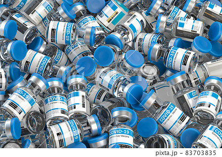 Covid 19 coronavirus vaccine bottles heap. 83703835
