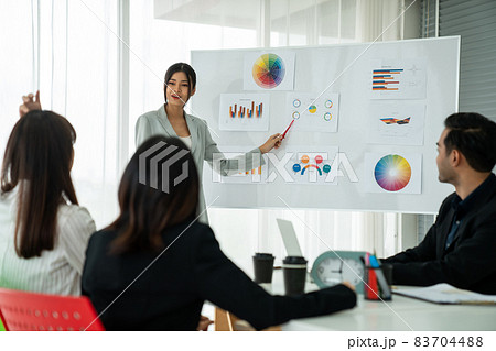 Business people proficiently discuss work project while sitting in circle Business people proficiently discuss work project while sitting in circle 83704488