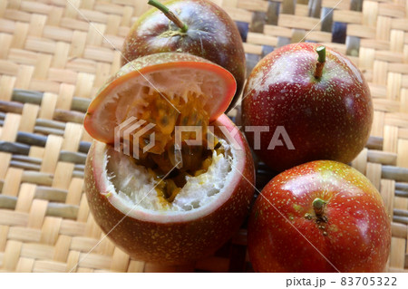 fresh passion fruit in a basket fresh passion fruit in a basket 83705322