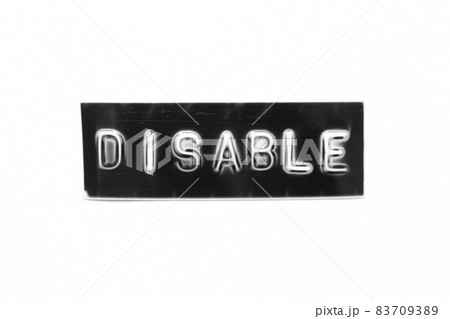 Black color banner that have embossed letter with word disable on white paper background Black color banner that have embossed letter with word disable on white paper background 83709389