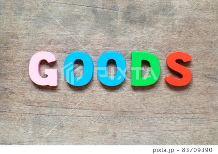 Color alphabet letter with word goods on wood background Color alphabet letter with word goods on wood background 83709390