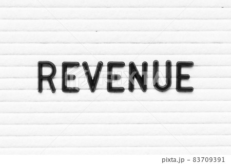 Black letter in word revenue on white felt board background Black letter in word revenue on white felt board background 83709391