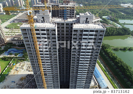 Aerial view of multistory apartment construction site in China Aerial view of multistory apartment construction site in China 83713162