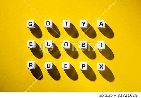 White cubes with letters scattered randomly White cubes with letters scattered randomly 83721628