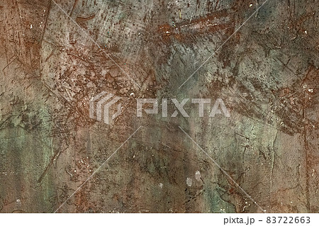 Pale red and green stone scratched and weathered plaster on concrete wall texture. Abstract background Pale red and green stone scratched and weathered plaster on concrete wall texture. Abstract background 83722663