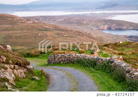 The coastal single track road between Meenacross and Crohy Head south of Dungloe, County Donegal - Ireland The coastal single track road between Meenacross and Crohy Head south of Dungloe, County Donegal - Ireland 83724157