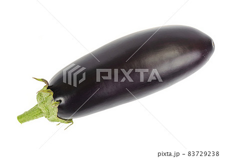 Ripe black purple eggplant with a green tail on a white background. Ripe black purple eggplant with a green tail on a white background. 83729238