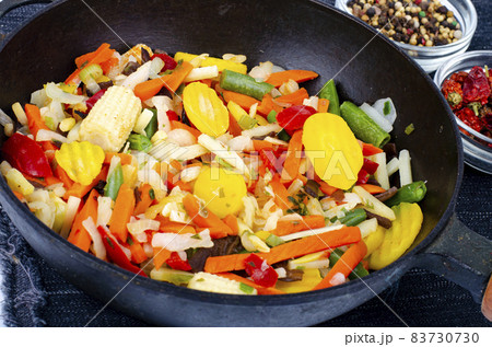 Seasonal vegetables platter in frying pan.Healthy food.Vegetarianism. Studio Photo. Seasonal vegetables platter in frying pan.Healthy food.Vegetarianism. Studio Photo. 83730730
