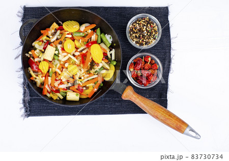 Seasonal vegetables platter in frying pan.Healthy food.Vegetarianism. Studio Photo. Seasonal vegetables platter in frying pan.Healthy food.Vegetarianism. Studio Photo. 83730734