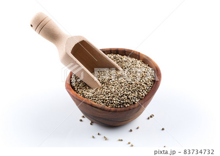Cannabis Hemp seeds in scoop on white Cannabis Hemp seeds in scoop on white 83734732