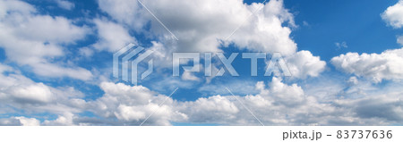 Beautiful blue sky with clouds at sunny bright day in summer Beautiful blue sky with clouds at sunny bright day in summer 83737636