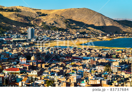 View of Puno with Lake Titicaca in Peru 83737684