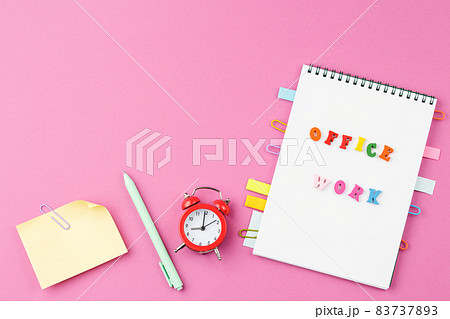 Notepad with wooden words on pink background. Notepad with wooden words on pink background. 83737893