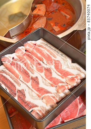 Raw pork slice in the dish Raw pork slice in the dish 83740074