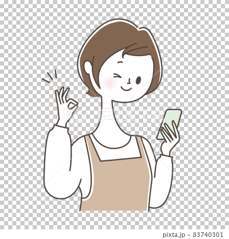 A woman holding a smartphone and giving an OK sign 83740301
