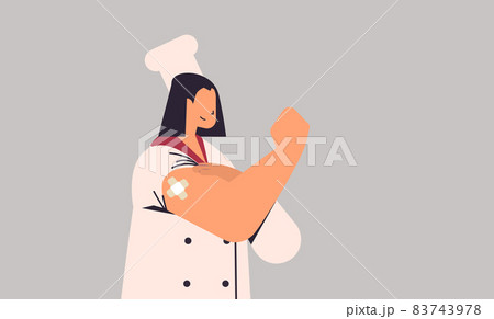 vaccinated woman chef in uniform after vaccine injection successful covid-19 vaccination horizontal portrait vaccinated woman chef in uniform after vaccine injection successful covid-19 vaccination horizontal portrait 83743978
