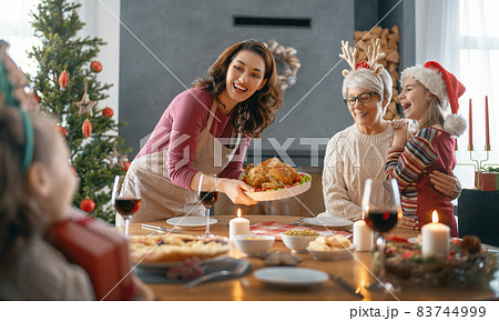 family celebrating Christmas family celebrating Christmas 83744999