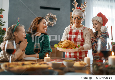 family celebrating Christmas family celebrating Christmas 83745034