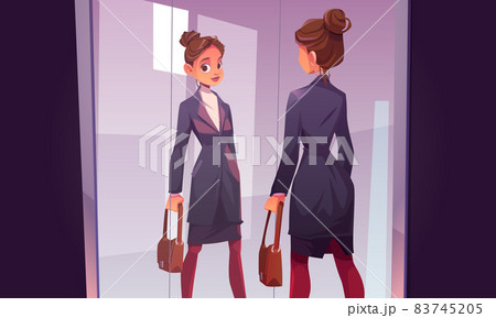 Business woman looks in big mirror 83745205