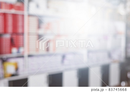 Blurred image of construction store with shelves of various construction and electric goods. Goods shelf in business supermarket. Gaussian blur filter applied Blurred image of construction store with shelves of various construction and electric goods. Goods shelf in business supermarket. Gaussian blur filter applied 83745668