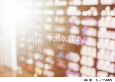 Blurred image of construction store with shelves of various construction and electric goods. Goods shelf in business supermarket. Gaussian blur filter applied Blurred image of construction store with shelves of various construction and electric goods. Goods shelf in business supermarket. Gaussian blur filter applied 83745669
