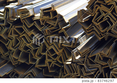 Metal profiles of different kinds are located in the metal products warehouse 83746297