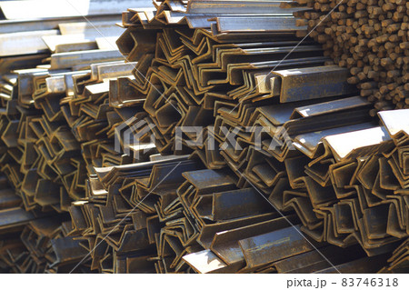Metal profiles of different kinds are located in the metal products warehouse Metal profiles of different kinds are located in the metal products warehouse 83746318